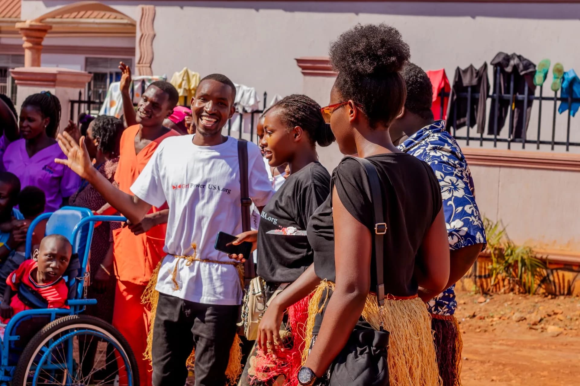 Community members and volunteers gathered together in Uganda